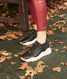Blending the ever-enduring streetwear trend with a more refined aesthetic, Pace is the ultimate in elevated athleisure. Crafted from a combination of super-soft leather and lightweight neoprene, elastic back panels and a sock-liner design maximise wrap-around control. An athletic midsole provides all-day comfort, while the sporty silhouette is finished with hiking-inspired laces to stabilize the foot. Team with everything from silky dresses to raw-edge denim for a decidedly modern lo