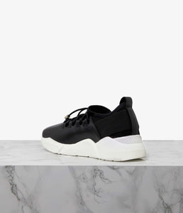 Blending the ever-enduring streetwear trend with a more refined aesthetic, Pace is the ultimate in elevated athleisure. Crafted from a combination of super-soft leather and lightweight neoprene, elastic back panels and a sock-liner design maximise wrap-around control. An athletic midsole provides all-day comfort, while the sporty silhouette is finished with hiking-inspired laces to stabilize the foot. Team with everything from silky dresses to raw-edge denim for a decidedly modern look.
