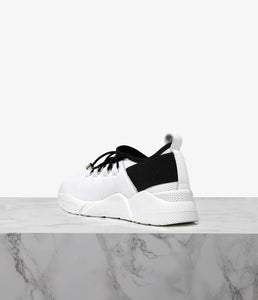 Blending the ever-enduring streetwear trend with a more refined aesthetic, Pace is the ultimate in elevated athleisure. Crafted from a combination of super-soft leather and lightweight neoprene, elastic back panels and a sock-liner design maximise wrap-around control. An athletic midsole provides all-day comfort, while the sporty silhouette is finished with hiking-inspired laces to stabilize the foot. Team with everything from silky dresses to raw-edge denim for a decidedly modern look.