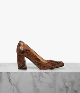 Designed with city living in mind, our block heel’s modern aesthetic makes for a versatile choice. Available in either super soft full-grain leather or embossed snake leather, the  spacious square toe box is comfortable enough for all-day wear while the chunky trapeze block heel adds the perfect amount of stability, support and lift on long days. Let the architectural silhouette add a directional feel to everything from wide-leg trousers to structured dresses.