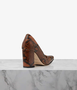 Designed with city living in mind, our block heel’s modern aesthetic makes for a versatile choice. Available in either super soft full-grain leather or embossed snake leather, the  spacious square toe box is comfortable enough for all-day wear while the chunky trapeze block heel adds the perfect amount of stability, support and lift on long days. Let the architectural silhouette add a directional feel to everything from wide-leg trousers to structured dresses.