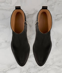 A modern take on Western-inspired ankle boots, Totem is designed to a striking, pointed-toe silhouette for a timeless, versatile feel. Crafted from a single piece of leather this seamless wonder is unmatched in both comfort and design. Finished with an asymmetrical cylinder heel, let the Totem adds a directional feel to both your on and off-duty wardrobe.